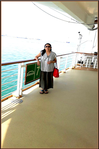 Mrs Majumder on the deck of Star Cruise